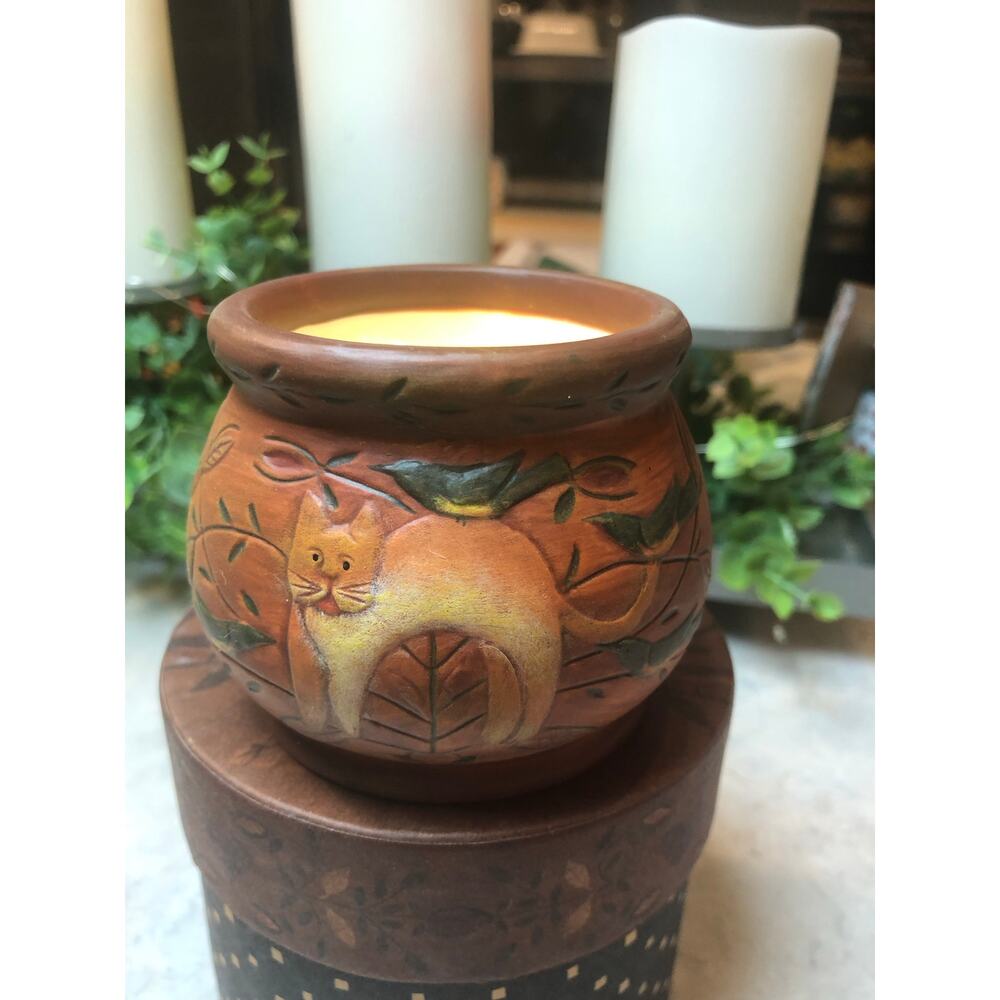 Primitive cat candle holder with birds, crouching cat brownish red tree branches